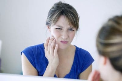 young man with toothache